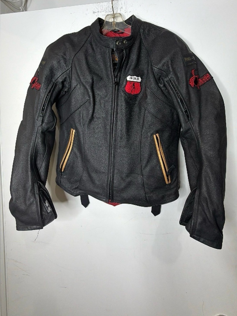 Black Leather Rider Jacket with Red Patch Details